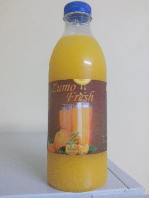 Juice of orange with his flesh 100 % native