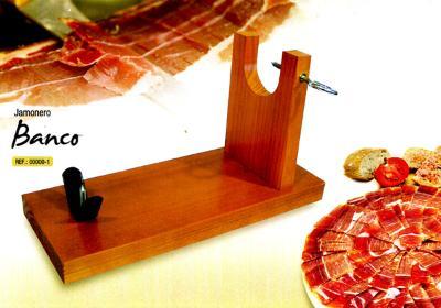 Ham composed of two wooden boards which support one another to hold the ham by a steel wing.