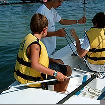 Organisation of two types of summer camps: sailing and sailing with English classes